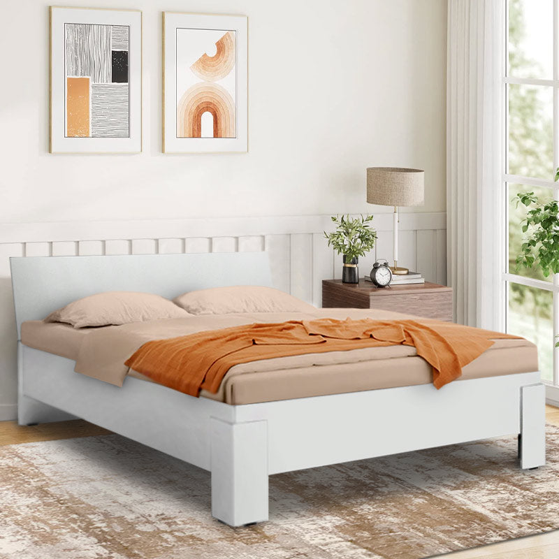 KARINA Double Bed in white, featuring a sleek melamine finish and spacious design, perfect for modern bedrooms.