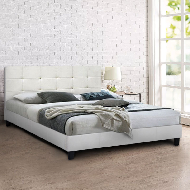 LUCIA Double Bed in white artificial leather, featuring anatomical slats and a sturdy wooden frame, perfect for stylish bedrooms.