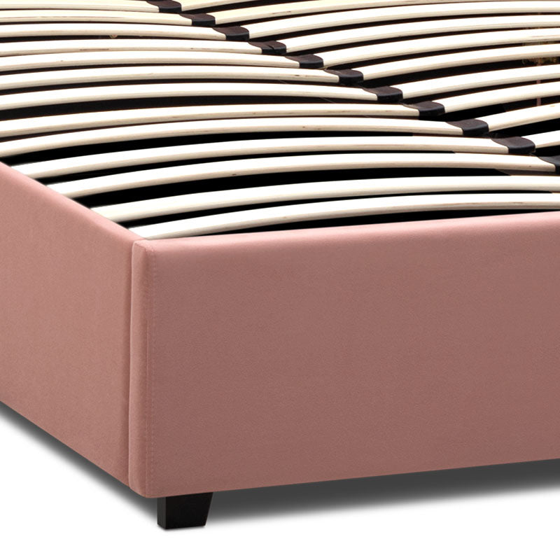 Double CELLO Pink bed with plush velvet upholstery and under-bed storage, featuring anatomical slats and black wooden legs.