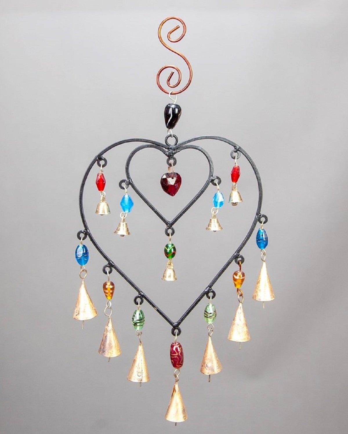 A colorful double heart design hanging chime made of glass beads and brass bells, showcasing vibrant colors and intricate craftsmanship.