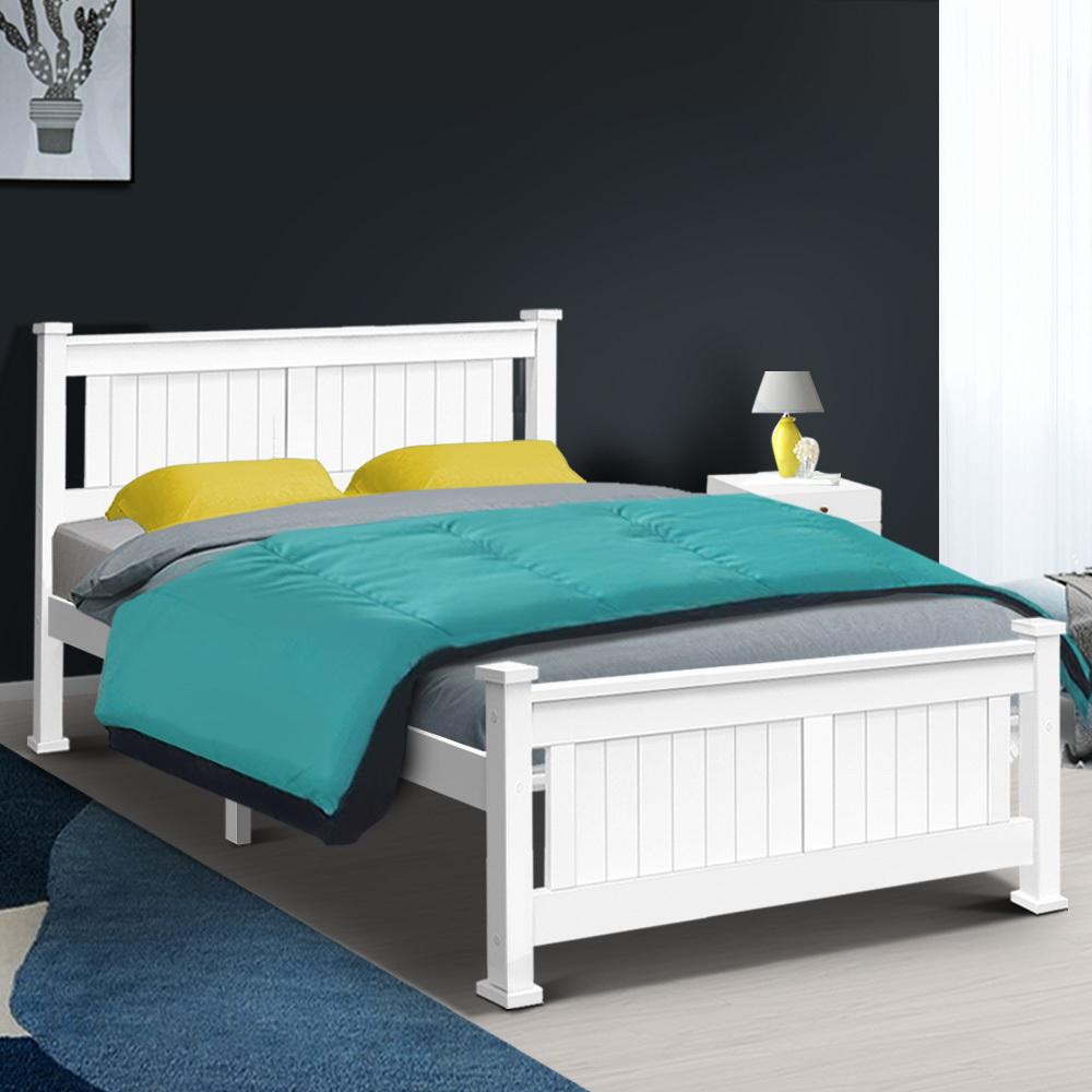 Double size wooden bed frame in white, made of solid pine wood with a stylish headboard and smooth edges.