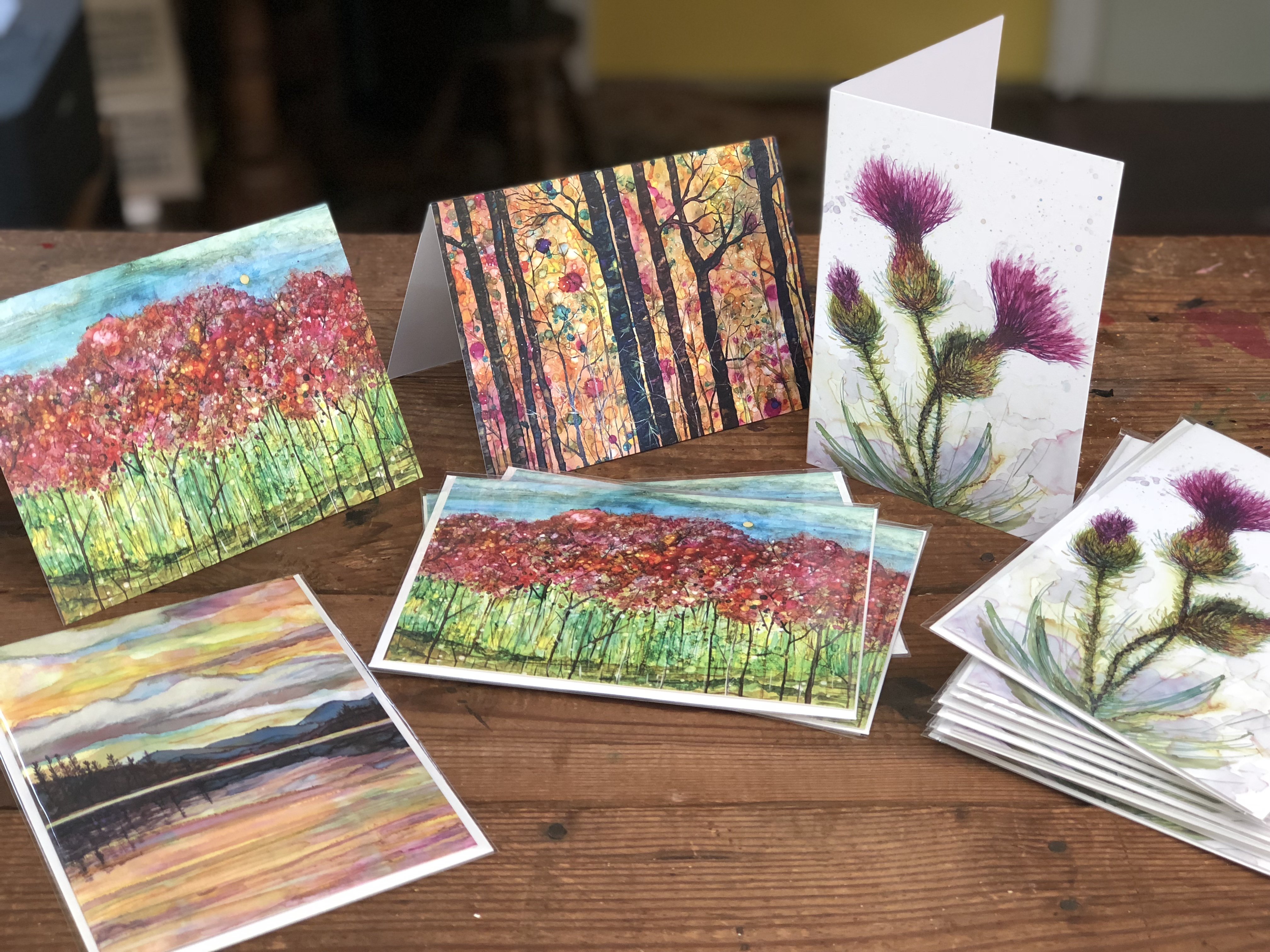 Dream Forest greeting card featuring vibrant mixed media art with intricate details and soothing colors, accompanied by a matching white envelope.