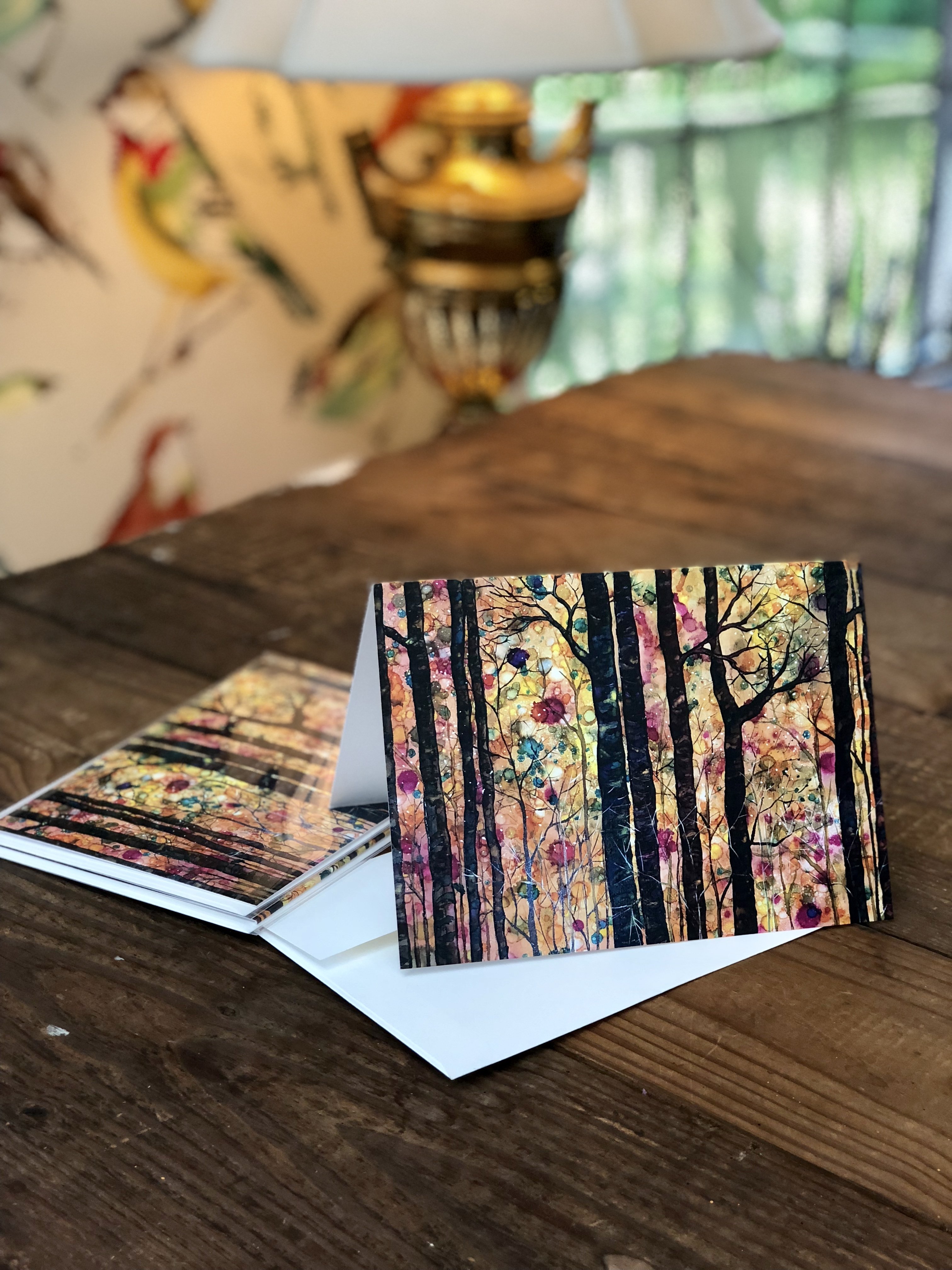 Dream Forest greeting card featuring vibrant mixed media art with intricate details and soothing colors, accompanied by a matching white envelope.