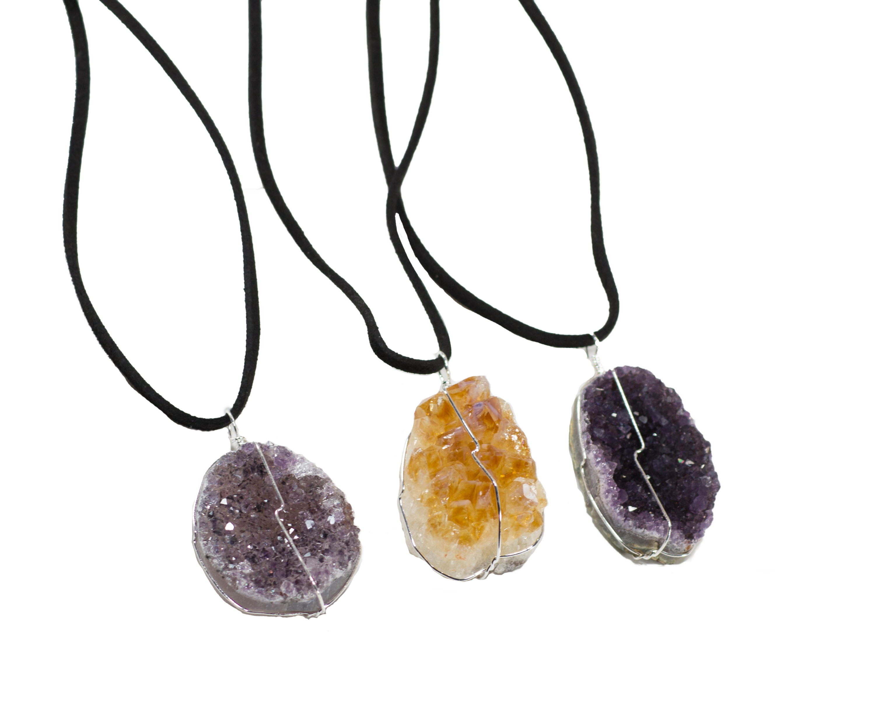 Druse crystal pendant on a leather necklace, showcasing vibrant amethyst, rose amethyst, and citrine crystals secured with silver wire.