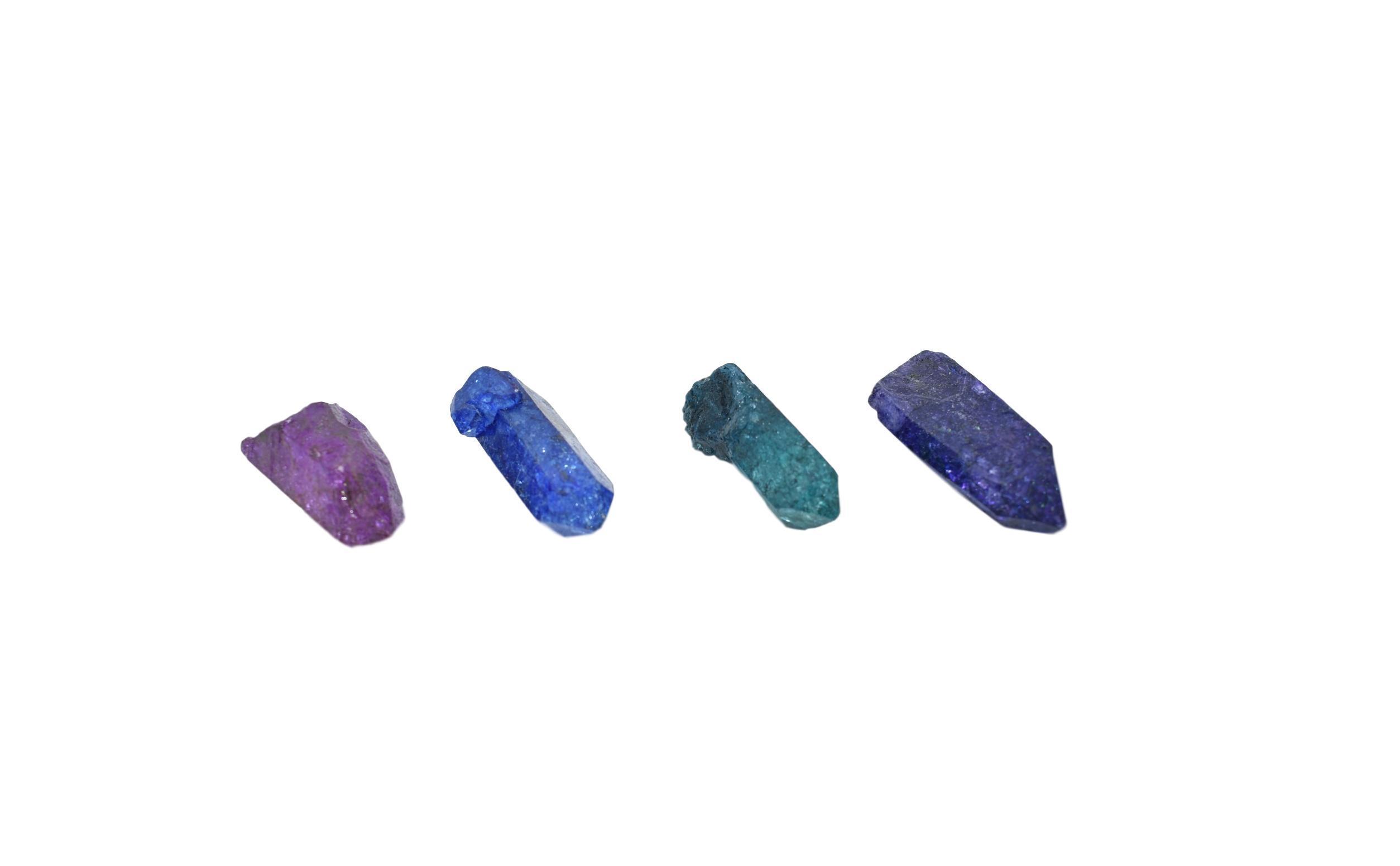 A collection of Dyed Quartz Points in vibrant colors including blue, teal, purple, and pink, showcasing their unique shapes and dazzling appearance.