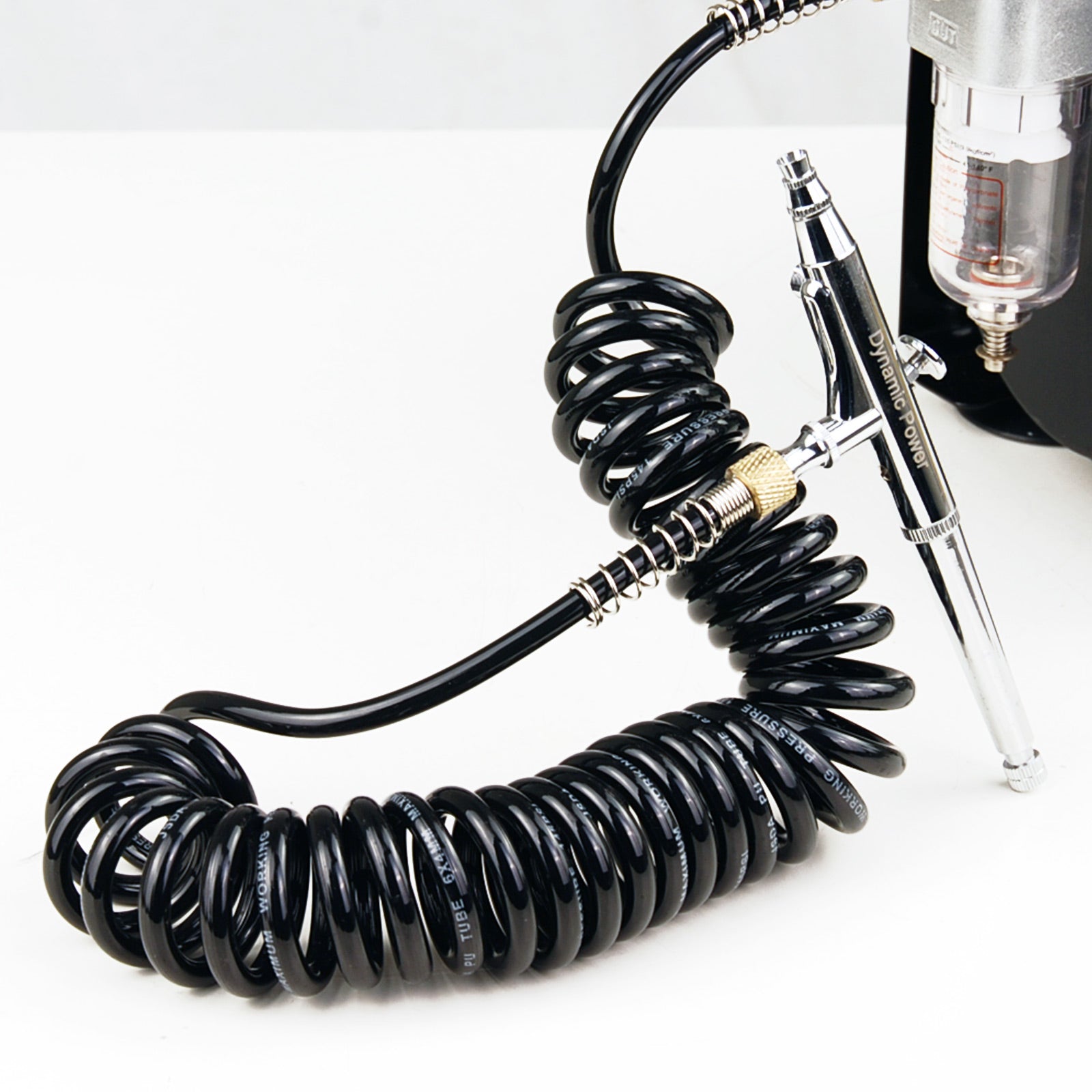 Dynamic Power 2 Set Air Brush Hose, coiled and retractable, made of braided rubber, suitable for airbrush and compressor use.