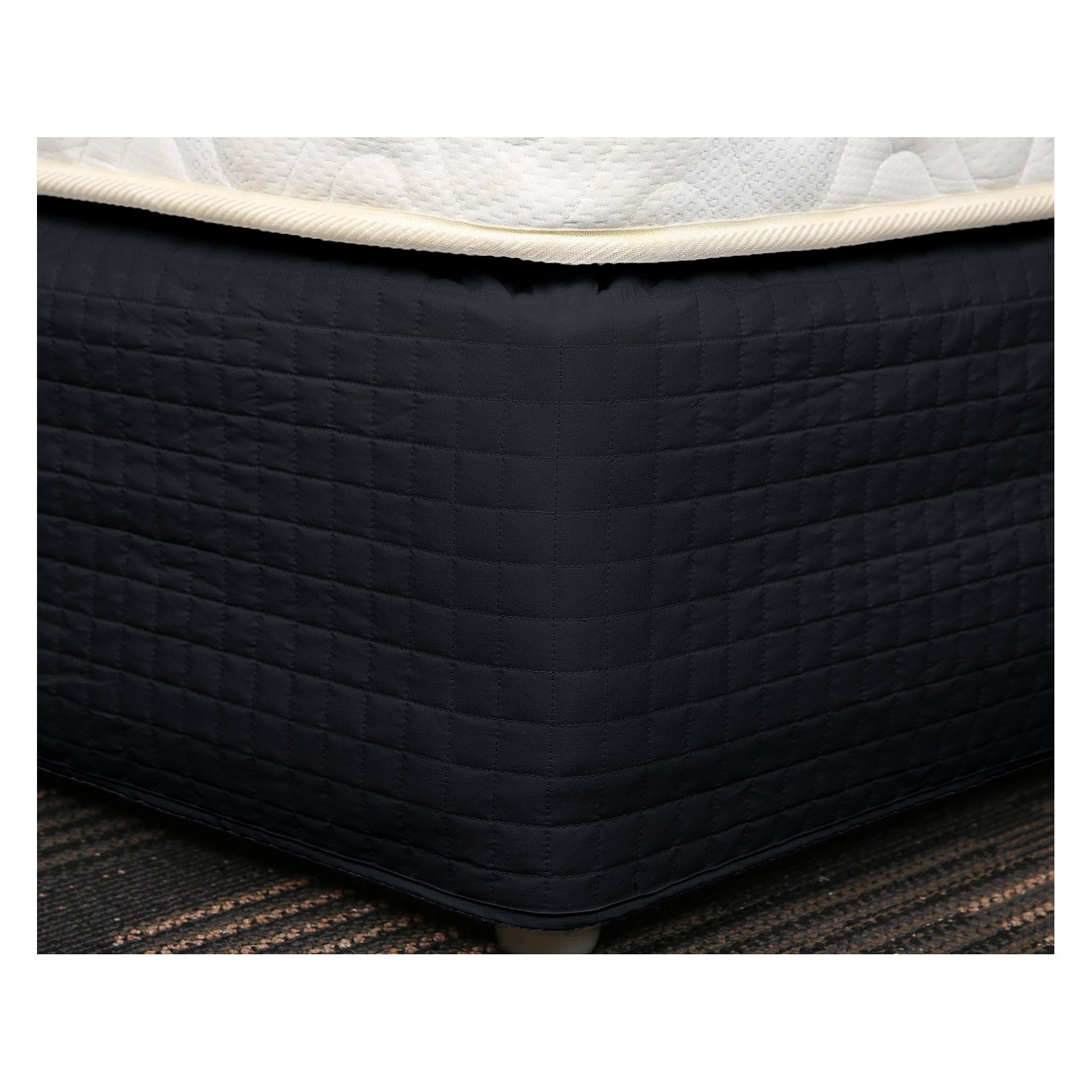 Easy Fit Quilted Valance in Black, featuring a box quilted design with elastic top for easy installation.