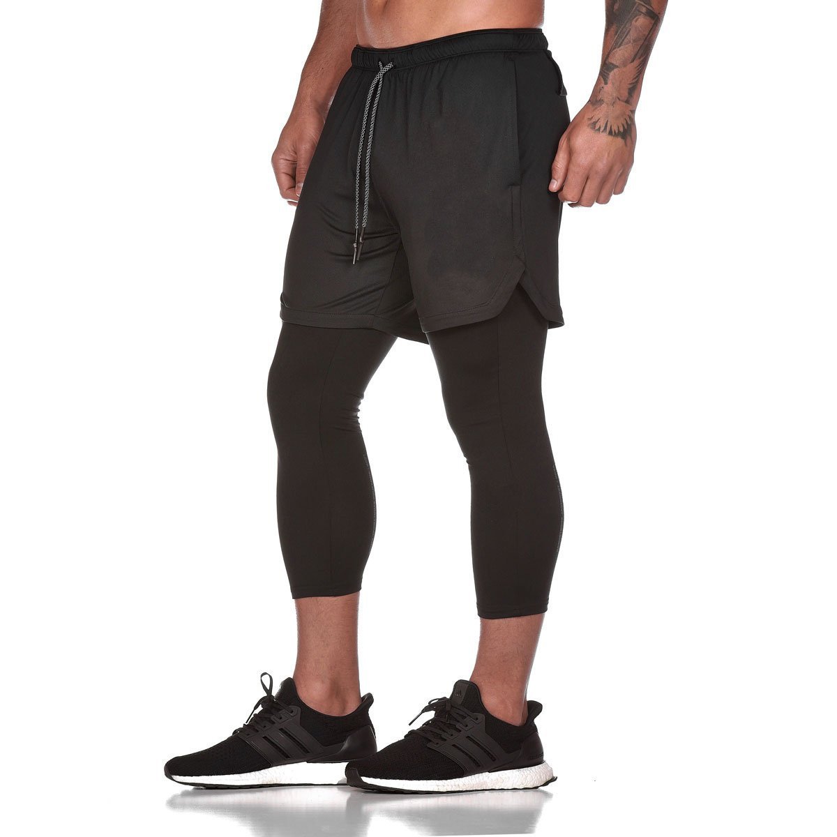 E-BAIHUI 2019 Men's Calf-Length Pants in black, showcasing the 2-in-1 design suitable for gym and outdoor activities.