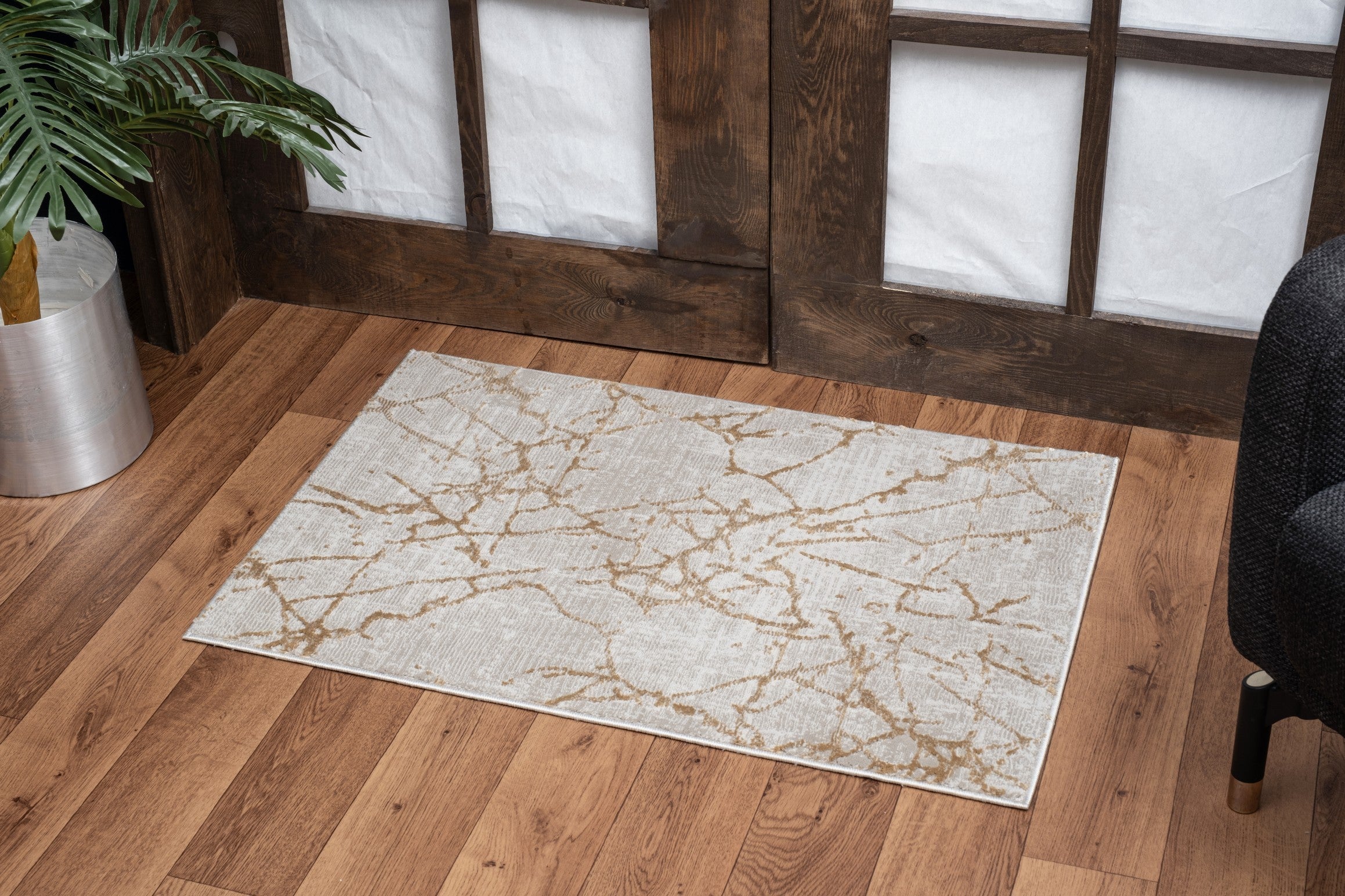 Elegance Gold 2 ft. x 3 ft. Area Rug in beige, showcasing its soft texture and elegant design, perfect for enhancing home decor.