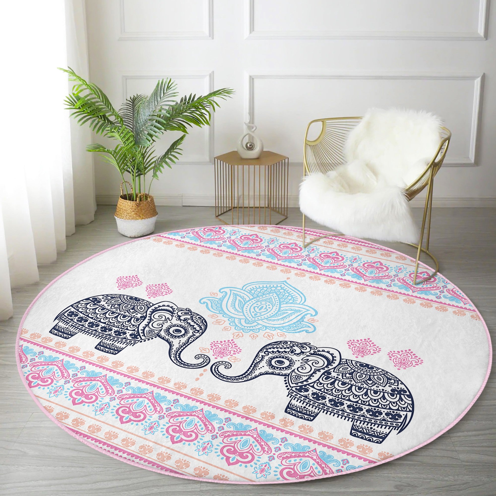 A beautifully designed round rug featuring an intricate elephant pattern, perfect for meditation rooms, showcasing vibrant colors and a soft texture.