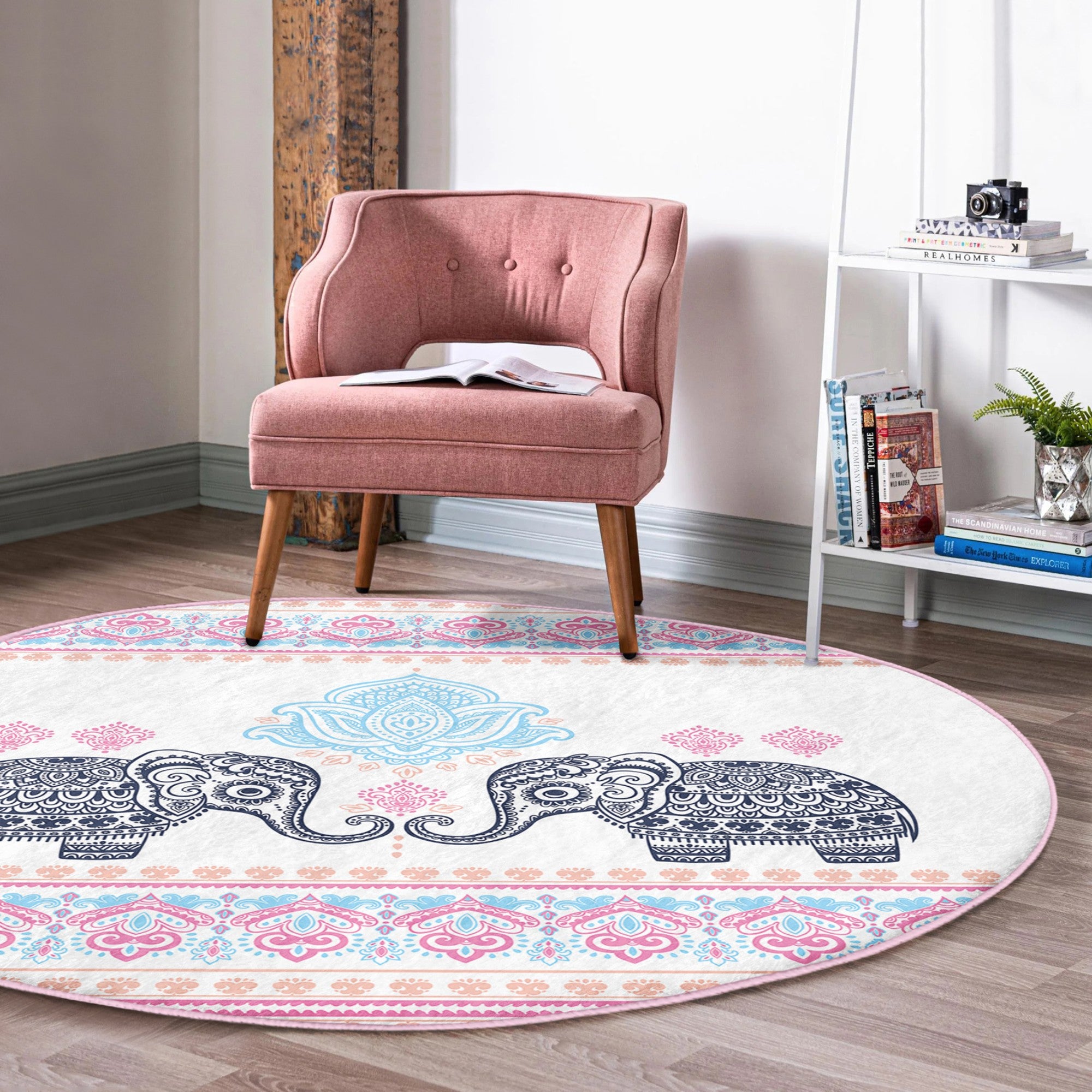 A beautifully designed round rug featuring an intricate elephant pattern, perfect for meditation rooms, showcasing vibrant colors and a soft texture.