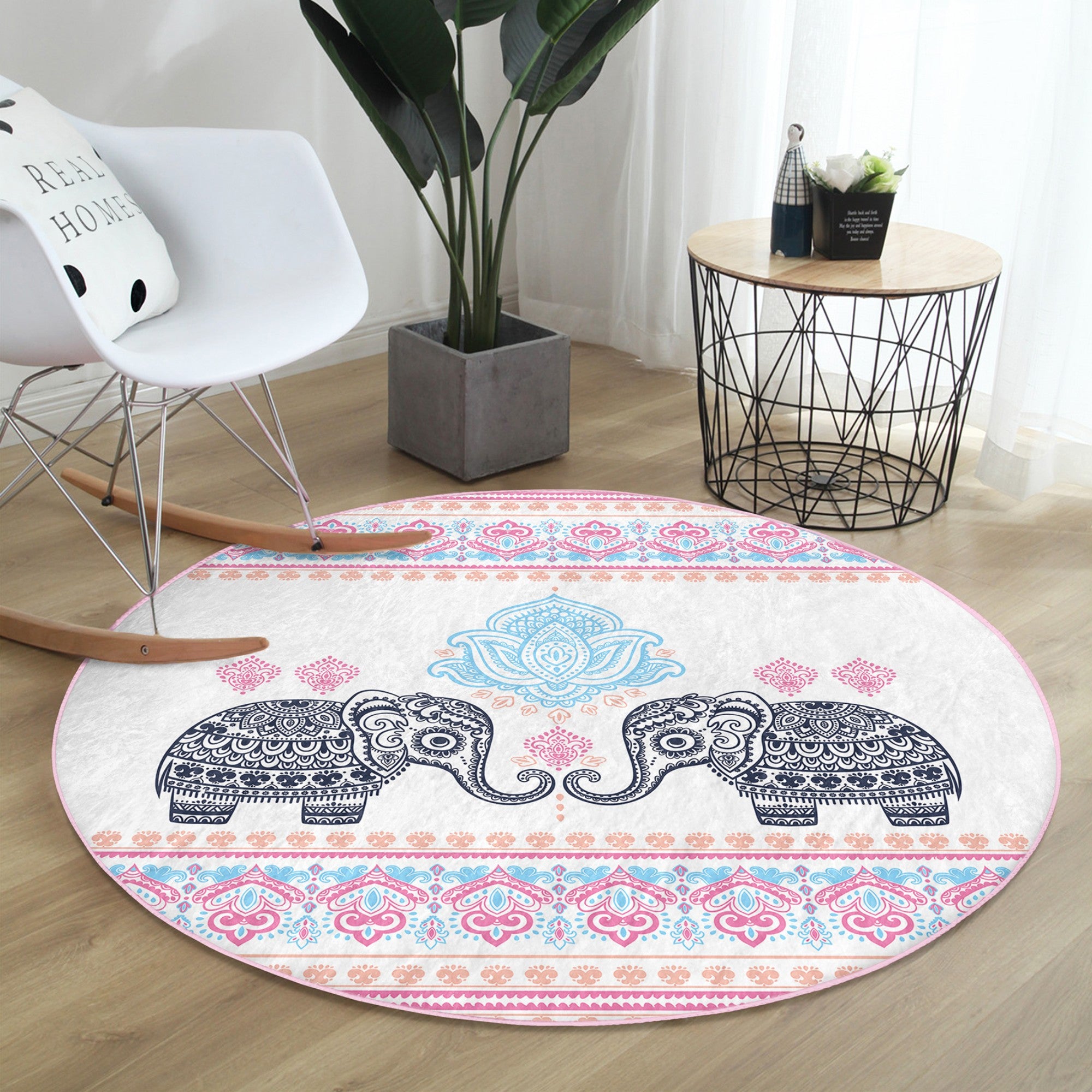 A beautifully designed round rug featuring an intricate elephant pattern, perfect for meditation rooms, showcasing vibrant colors and a soft texture.