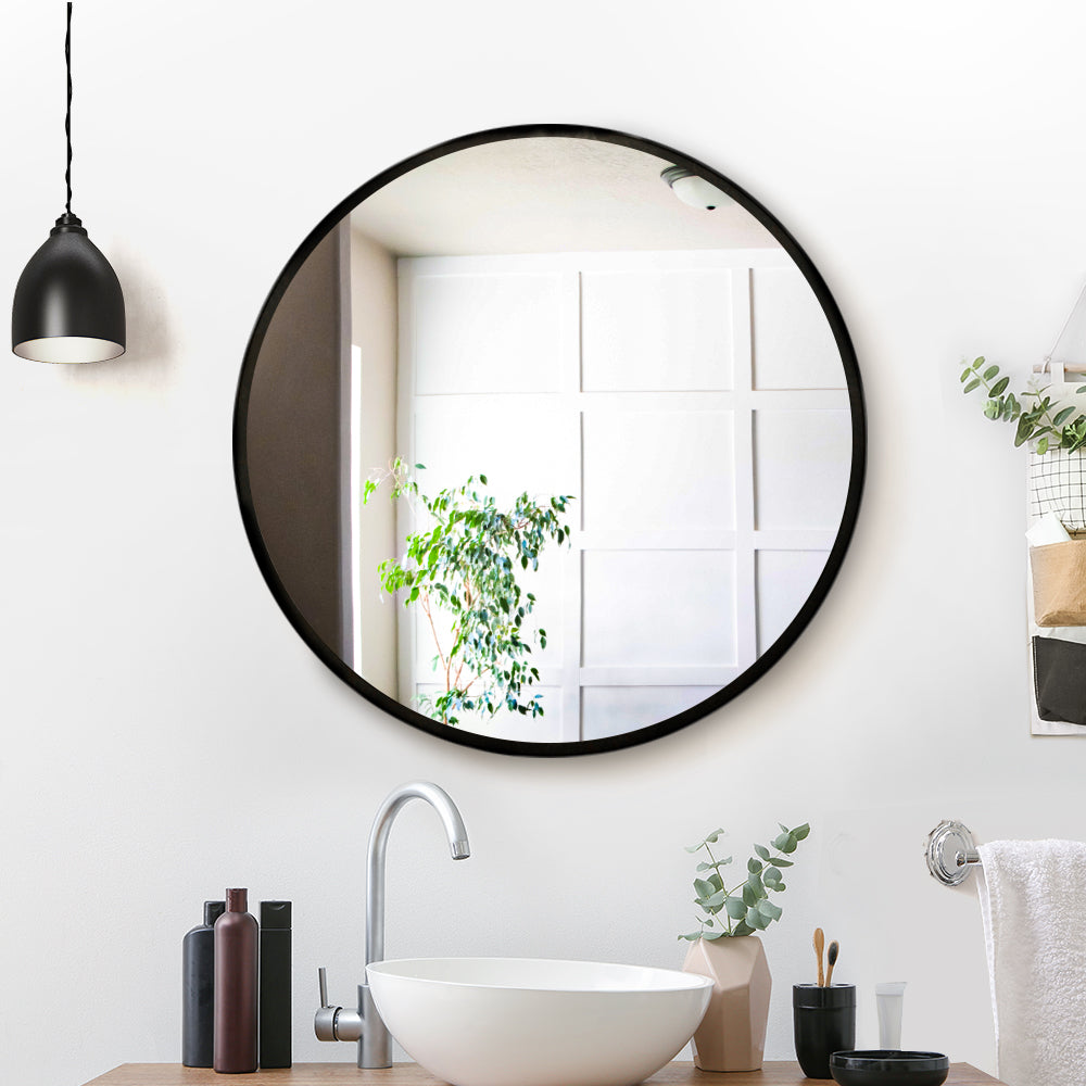 Embellir 60cm round wall mirror with silver plating and MDF backing, showcasing clarity and elegant design.