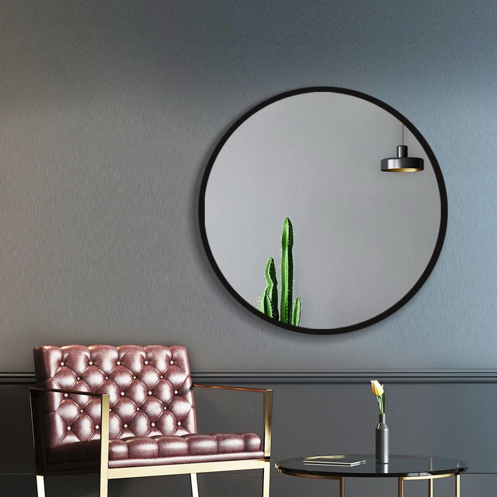 Embellir Round Wall Mirror with a 50cm diameter, frameless design, showcasing clarity and craftsmanship, ideal for makeup and bathroom use.