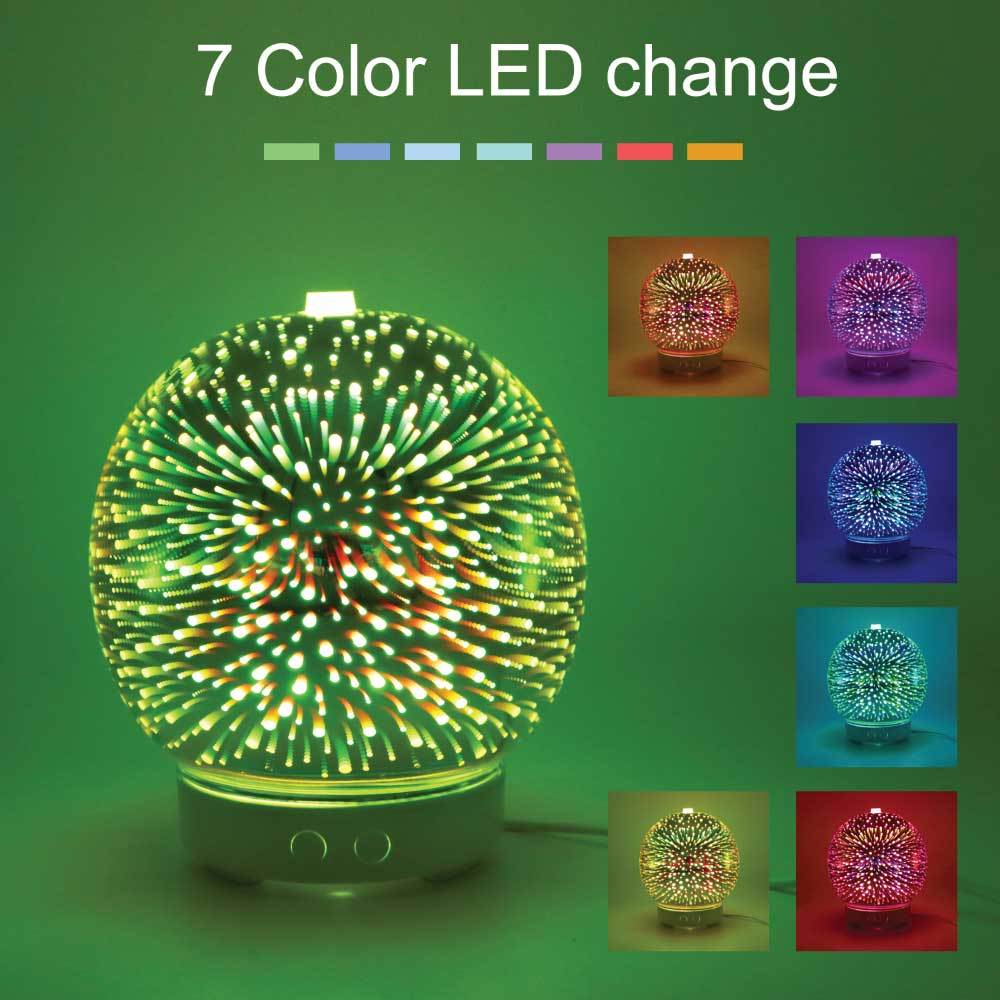 Essential Oil Aroma Diffuser with 3D fireworks effect, showcasing vibrant colors and elegant glass design, perfect for home decor and aromatherapy.