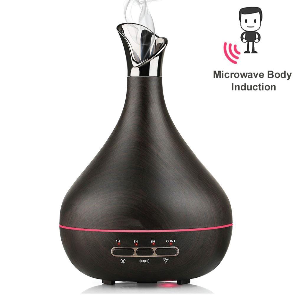 Essential Oil Aroma Diffuser in dark wood grain tulip design, showcasing its elegant shape and remote control feature.