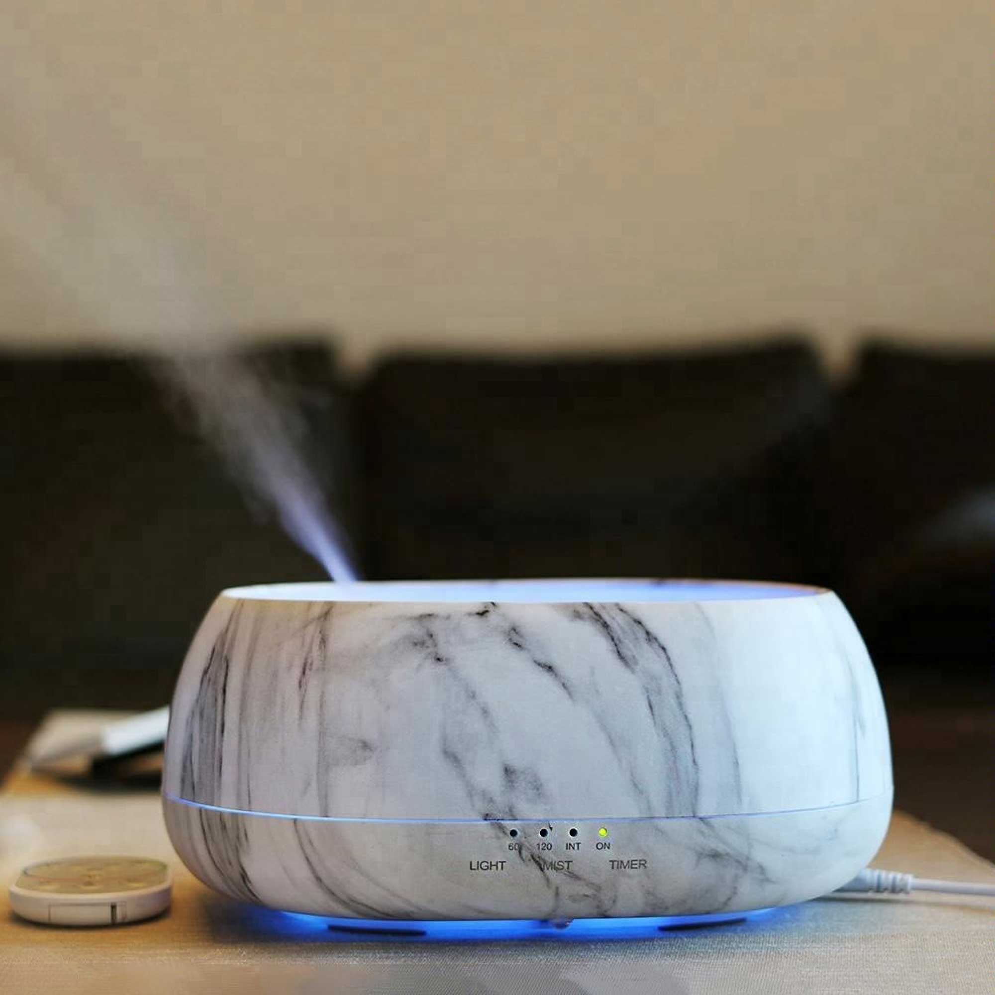 500ml Marble Aroma Diffuser with remote control, featuring a sleek white and grey marble design, perfect for aromatherapy.