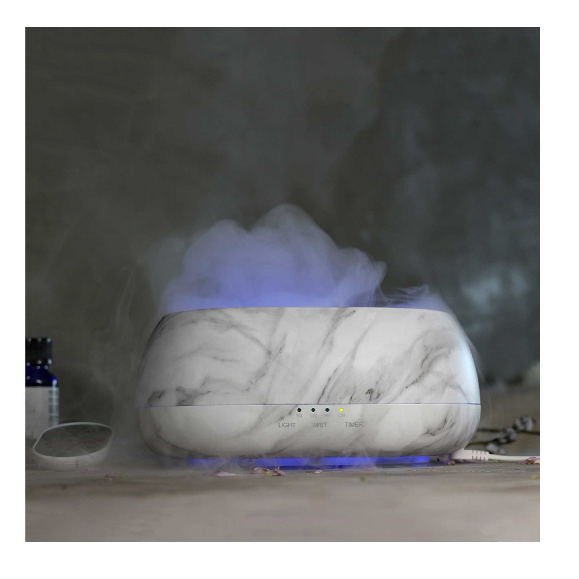 500ml Marble Aroma Diffuser with remote control, featuring a sleek white and grey marble design, perfect for aromatherapy.