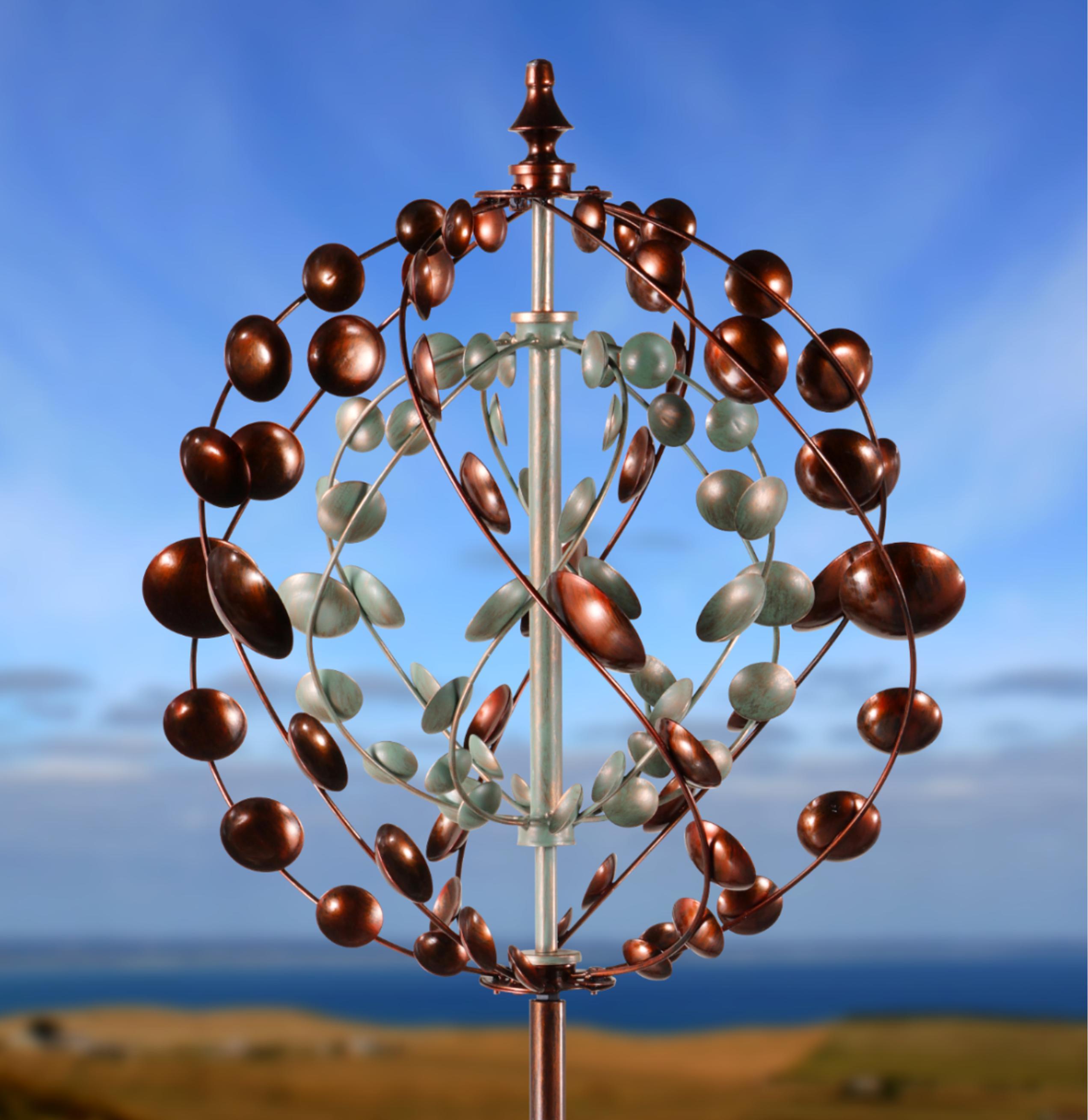 Eton garden wind sculpture spinner with bronze and verdigris sails, standing tall at 1.91m, adding elegance to outdoor spaces.