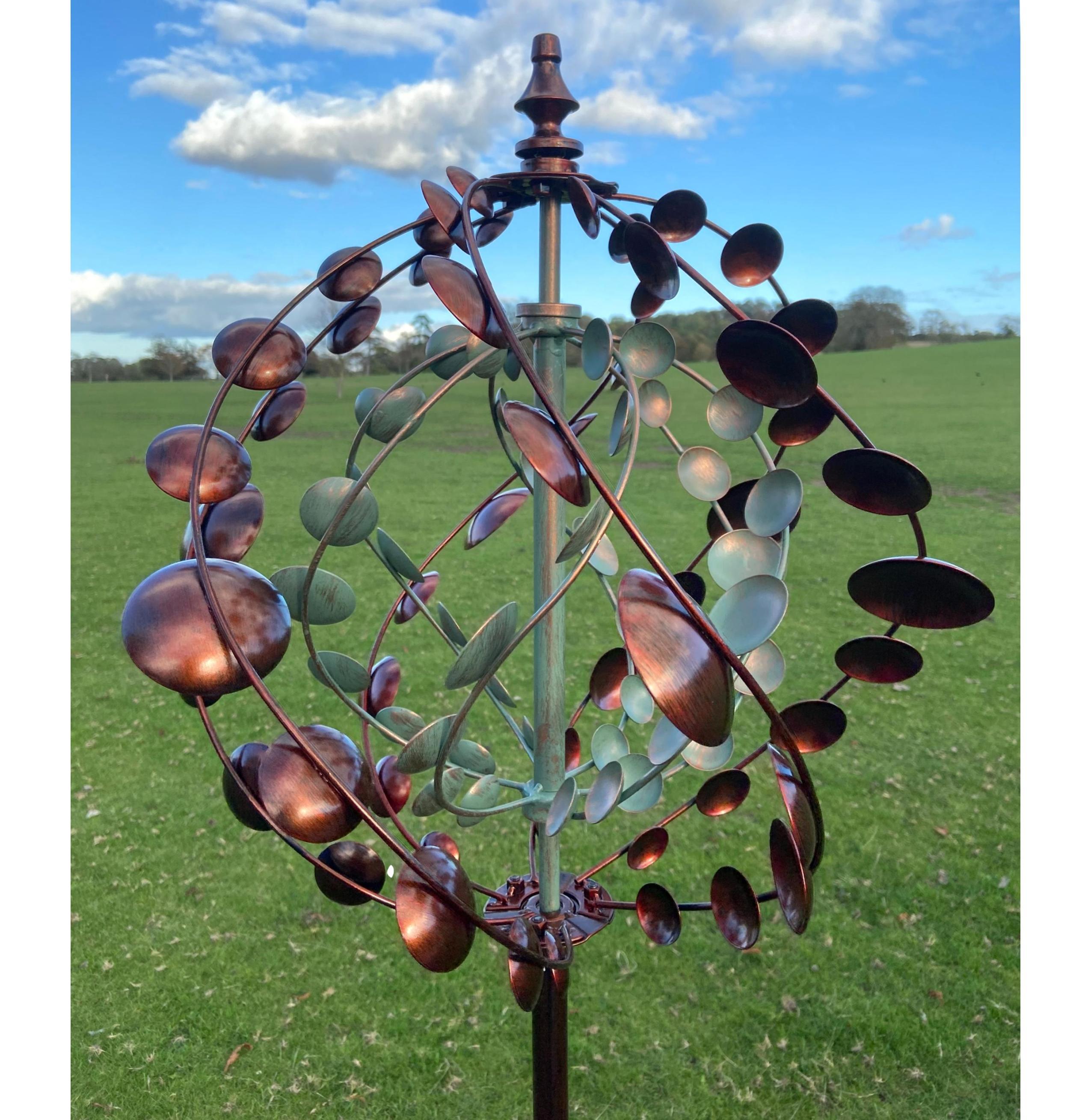 Eton garden wind sculpture spinner with bronze and verdigris sails, standing tall at 1.91m, adding elegance to outdoor spaces.