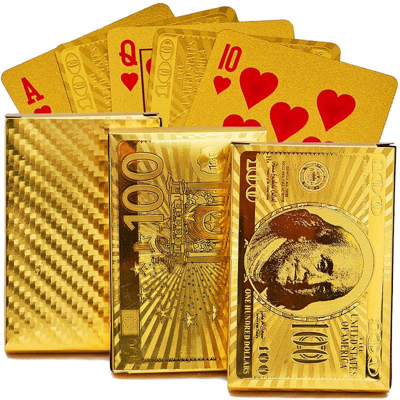 A luxurious deck of EURO USD Back Golden Playing Cards featuring high-grade gold foil and deep embossing, elegantly packaged in a golden box.