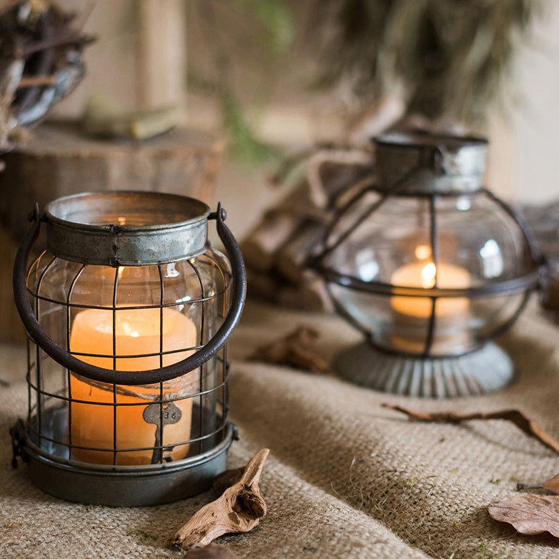 European Restoration Candle Holder in gray and rust, made of glass and metal, showcasing its elegant design and dimensions.