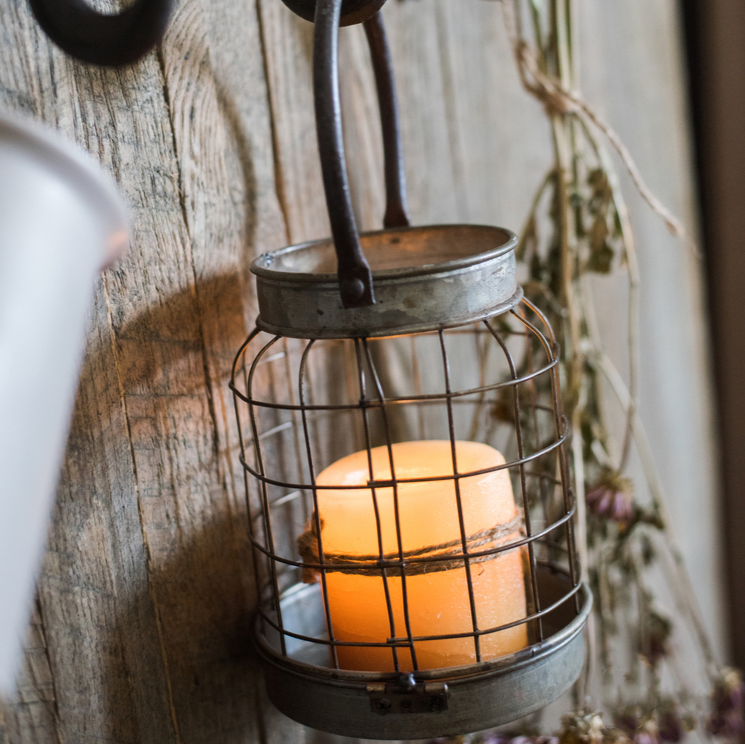 European Restoration Candle Holder in gray and rust, made of glass and metal, showcasing its elegant design and dimensions.