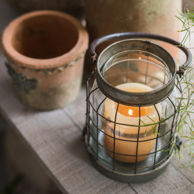 European Restoration Candle Holder in gray and rust, made of glass and metal, showcasing its elegant design and dimensions.