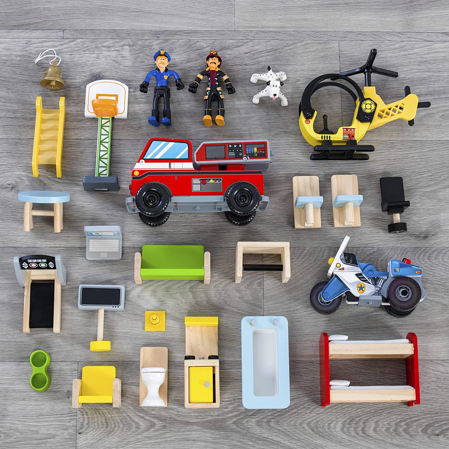 Everyday Heroes Play Set featuring police motorcycle, fire truck, helicopter, and bendable figures for kids' imaginative play.