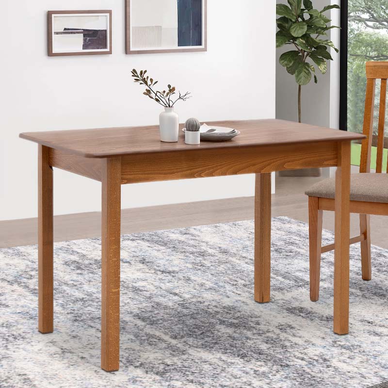 HORA Extendable Dining Table in walnut finish, showcasing its solid beech wood legs and MDF surface.