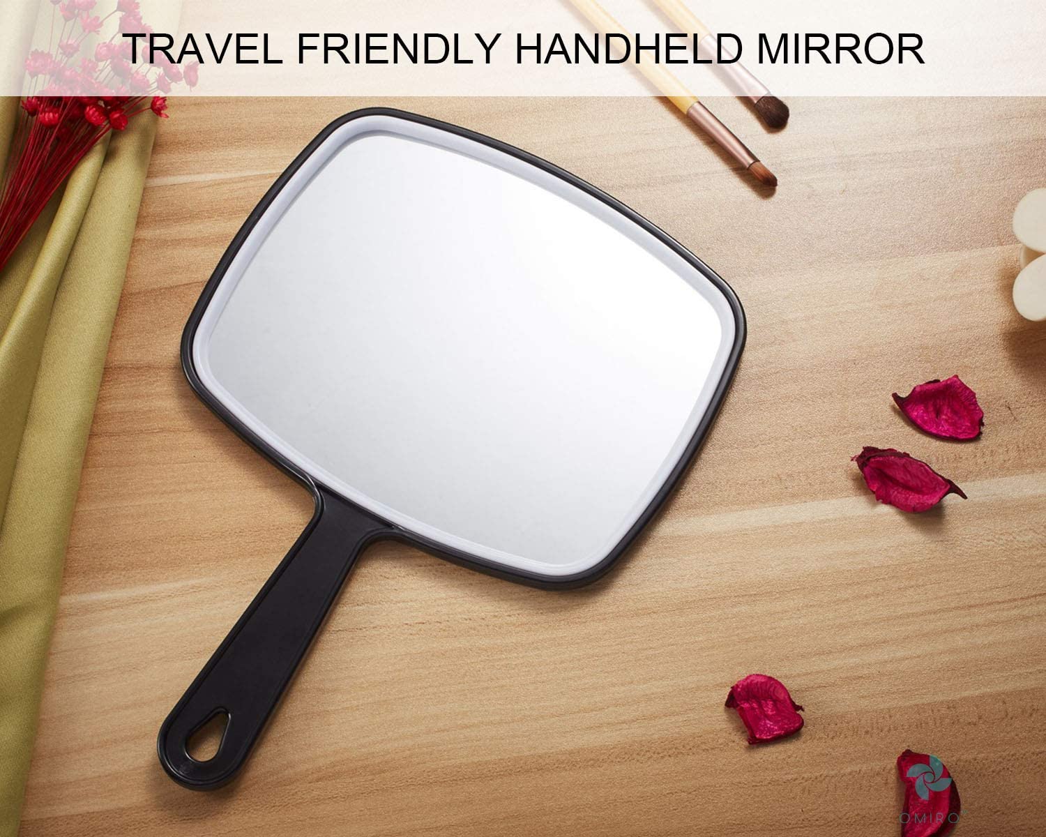 Extra Large Black Handheld Mirror with Handle, featuring a sleek black design and large viewing surface for grooming.