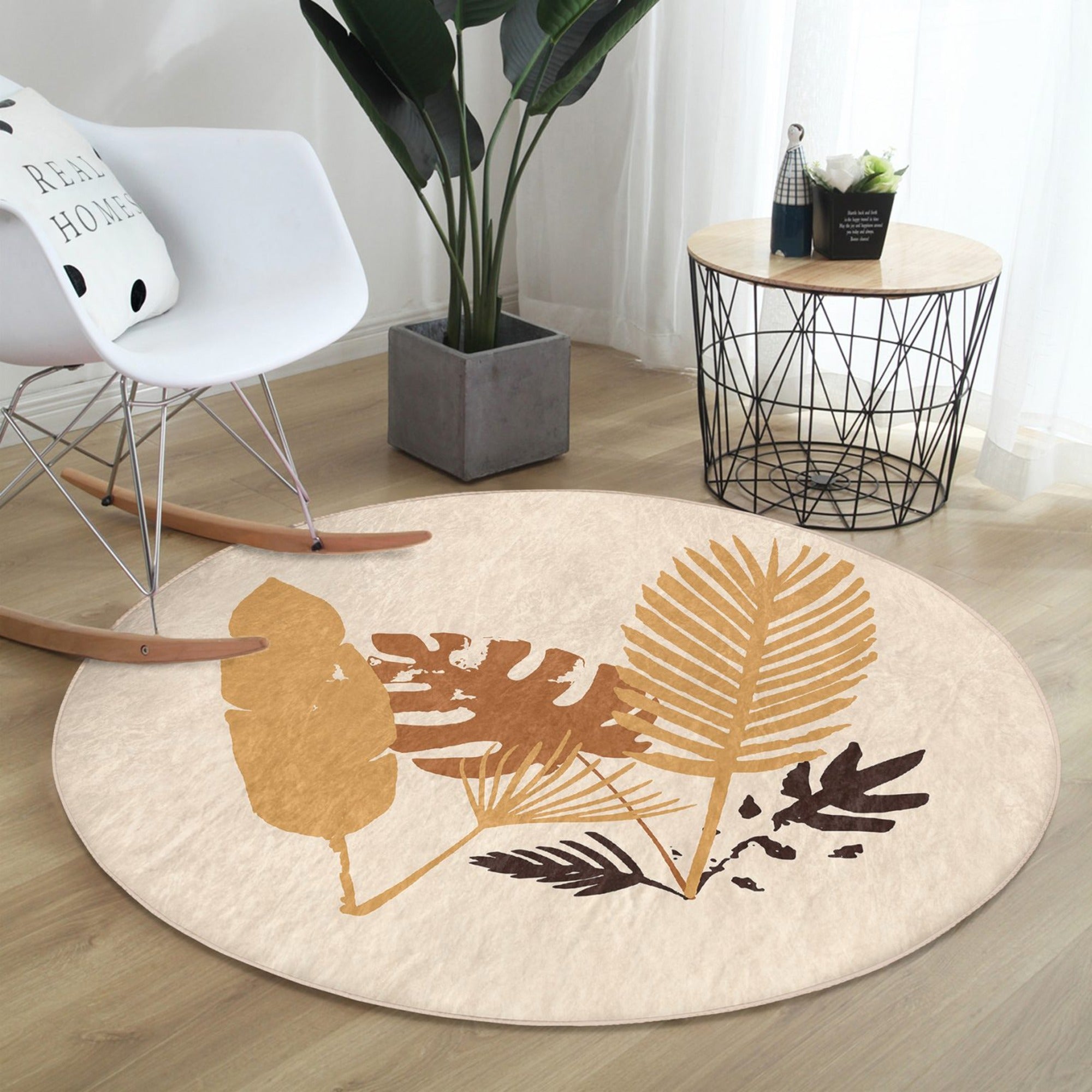 A round rug featuring a vibrant fall leaves pattern, perfect for autumn home decor, made from durable polyester and cotton.