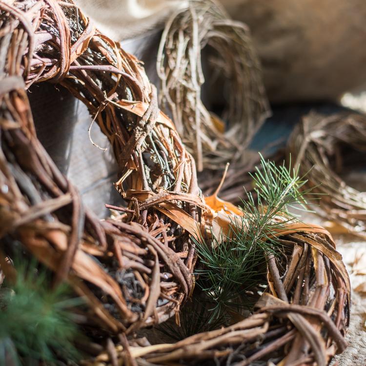 Handmade Fall Natural Rattan and Willow Wreath, featuring earthy tones and unique textures, perfect for Christmas decoration.