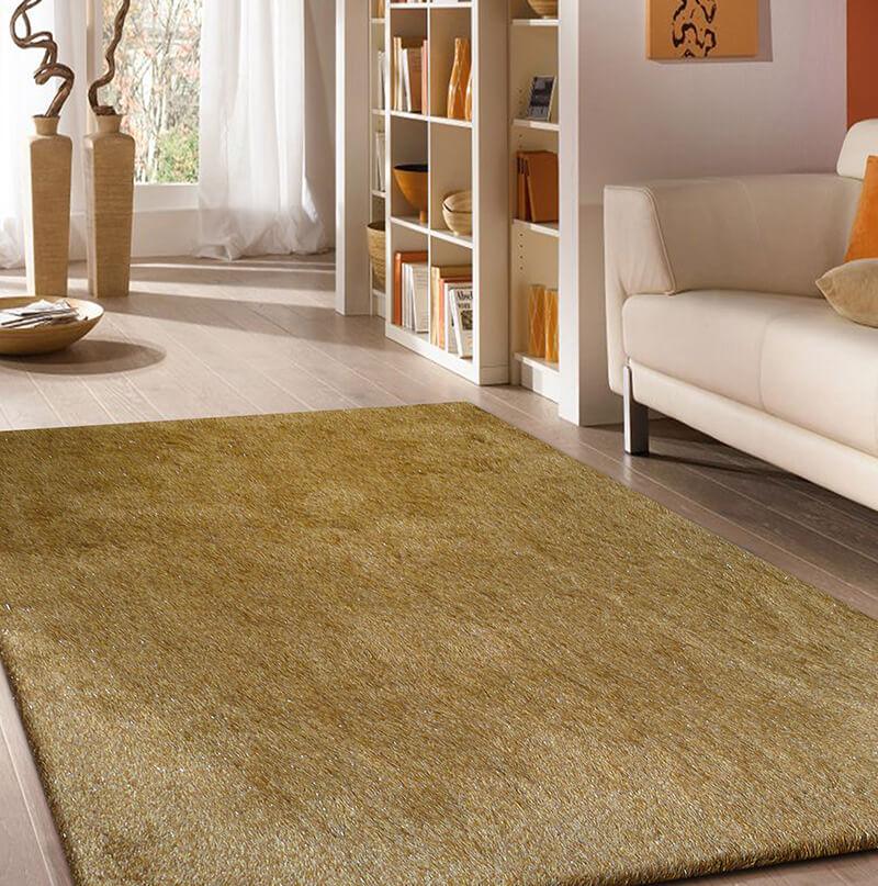 Fancy Collection Gold Shag Area Rug showcasing plush texture and rich gold color, perfect for enhancing home decor.