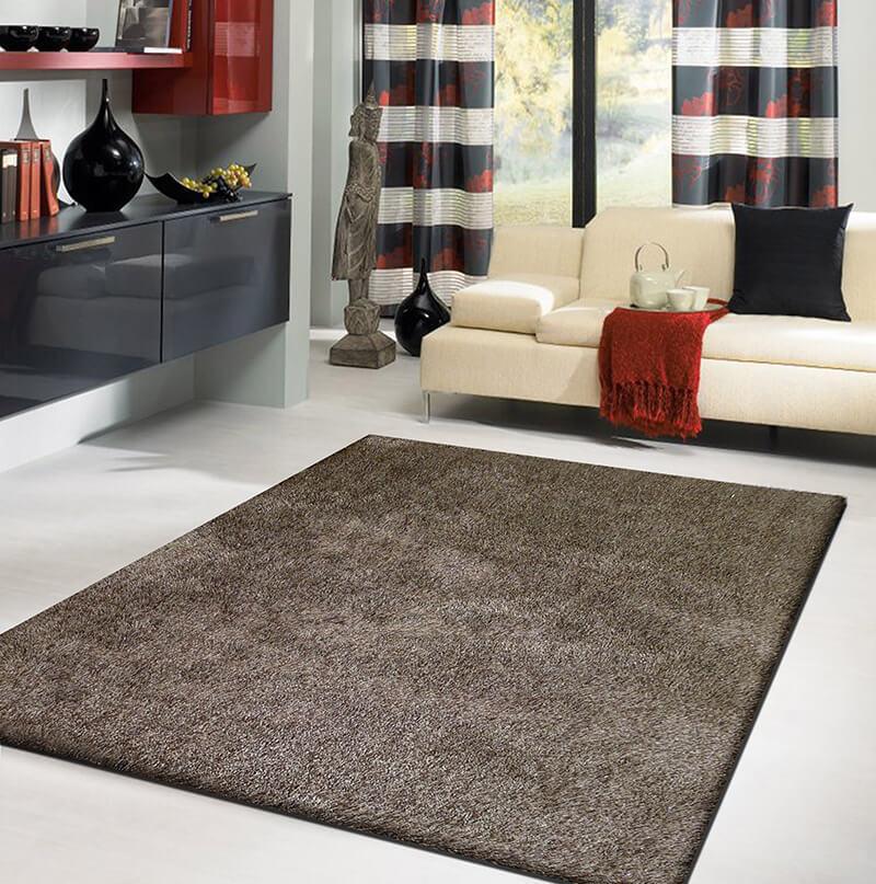 Fancy Collection Solid Brown Shag Area Rug with plush texture and rich brown color, perfect for enhancing home decor.