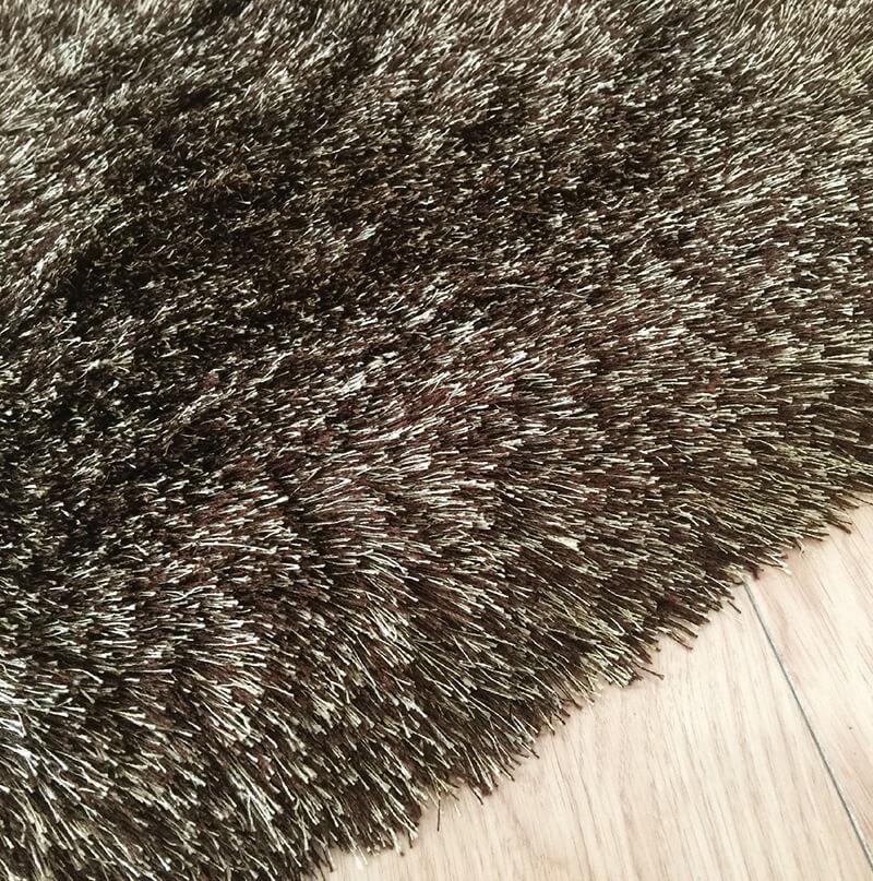 Fancy Collection Solid Brown Shag Area Rug with plush texture and rich brown color, perfect for enhancing home decor.