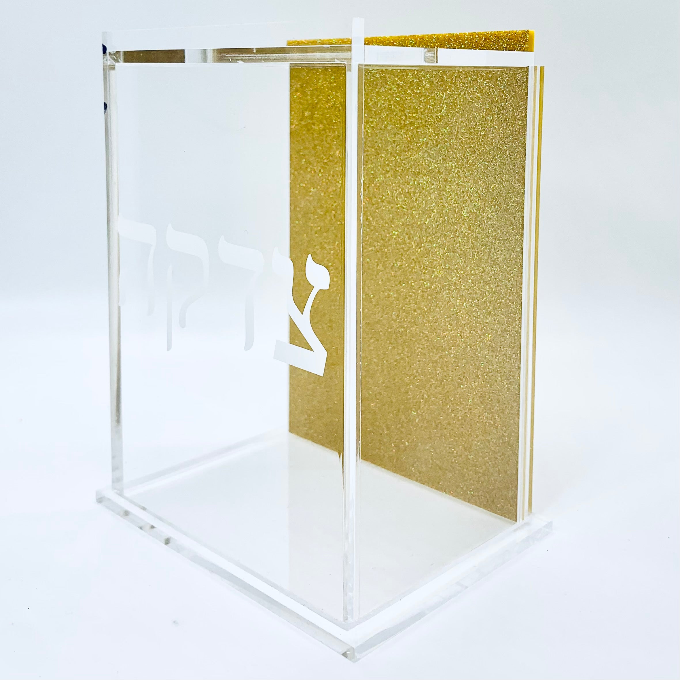 Elegant gold Fancy Lucite Tzedakah Box measuring 6 x 4 x 3 inches, featuring a convenient back opening.