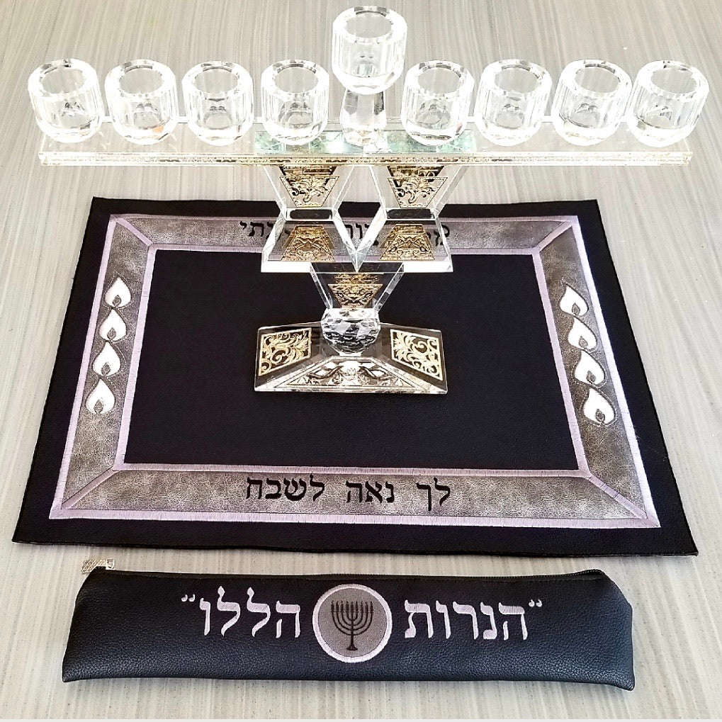 Elegant leather Menorah mat with embroidered Hanukkah phrases and matching shamash pouch, available in three colors.