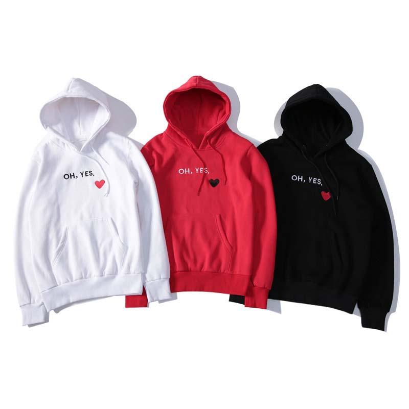 Men's fashion designer hoodies in solid colors, showcasing a stylish and comfortable design suitable for couples.