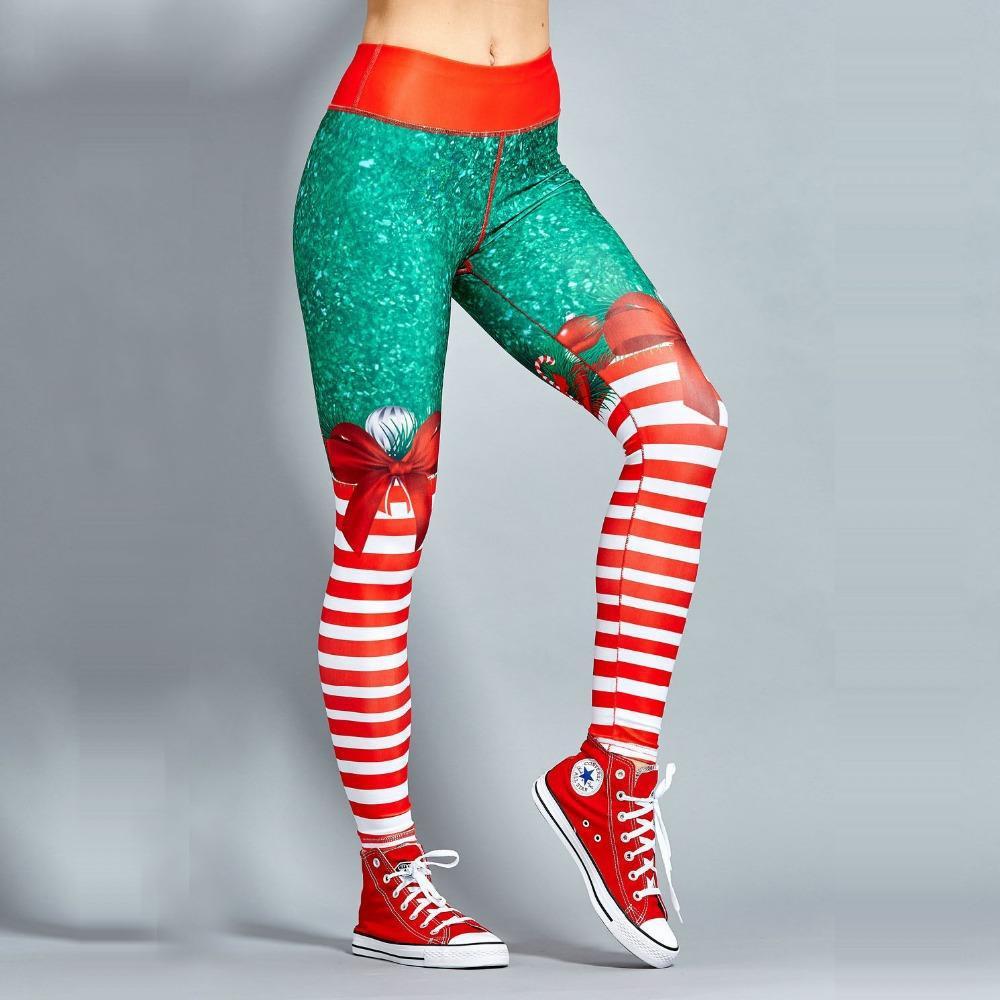 Women wearing festive Father Christmas leggings, showcasing a vibrant print perfect for Christmas cosplay and yoga activities.