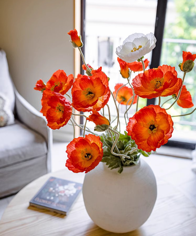 A tall 41-inch faux silk poppy flower stem in vibrant pink, red, and white colors with lush green leaves, perfect for home decor.