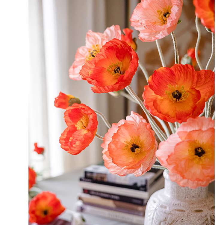 A tall 41-inch faux silk poppy flower stem in vibrant pink, red, and white colors with lush green leaves, perfect for home decor.