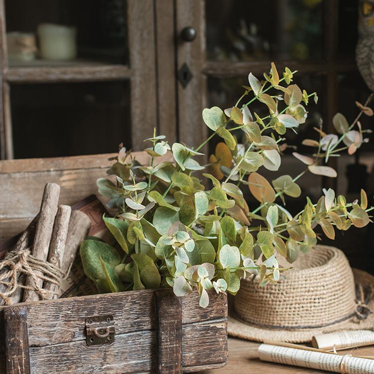 Faux Leaf Autumn Eucalyptus Artificial Stem in vibrant autumn colors, showcasing its realistic leaves and elegant design.