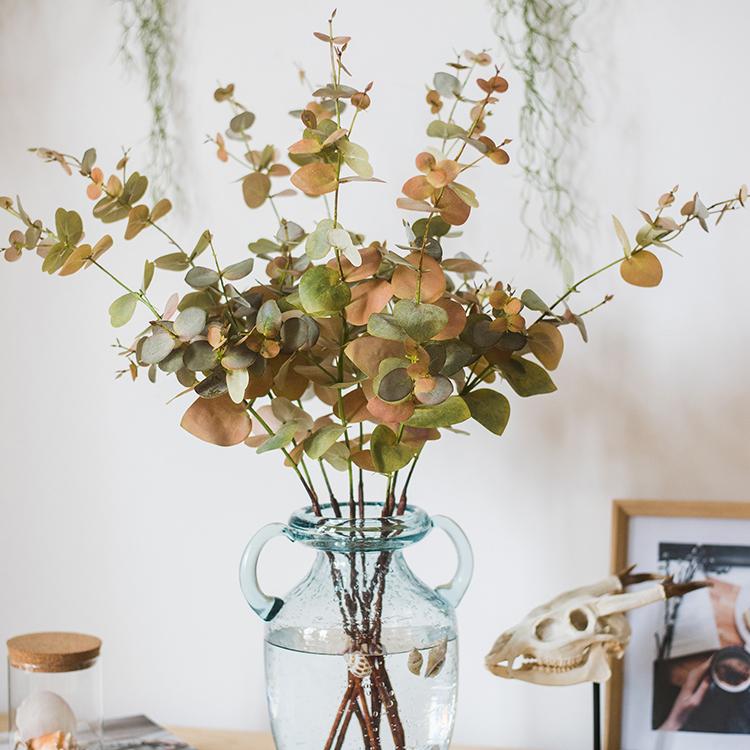 Faux Leaf Autumn Eucalyptus Artificial Stem in vibrant autumn colors, showcasing its realistic leaves and elegant design.