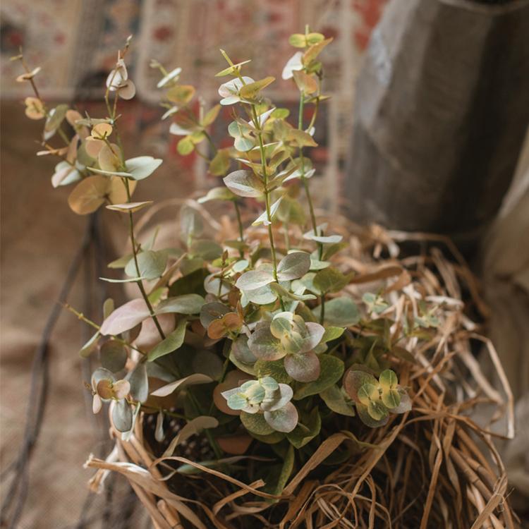 Faux Leaf Autumn Eucalyptus Artificial Stem in vibrant autumn colors, showcasing its realistic leaves and elegant design.