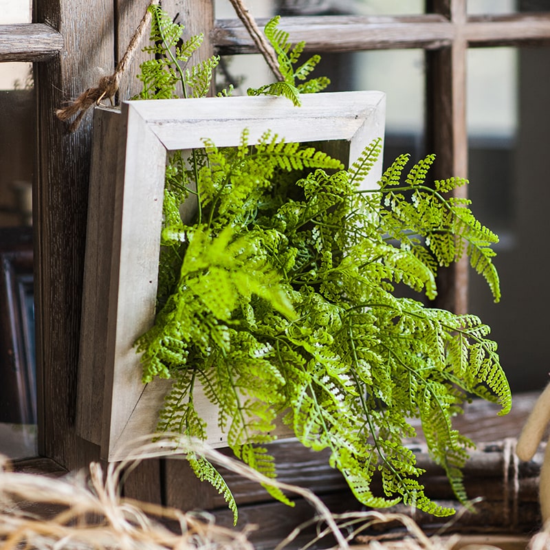 Faux Plant Oba Fern in a rustic wooden frame, showcasing realistic green leaves and a weathered finish.