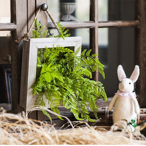 Faux Plant Oba Fern in a rustic wooden frame, showcasing realistic green leaves and a weathered finish.