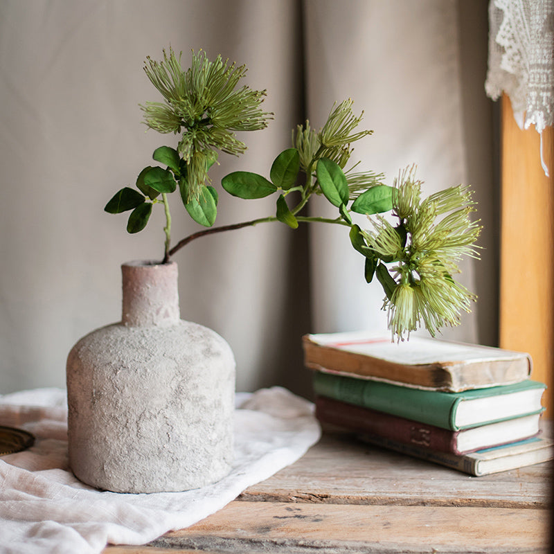 A 25-inch tall Faux Silk Artificial Albizia Flower Stem with three vibrant blooms and a green stem, perfect for home decor.