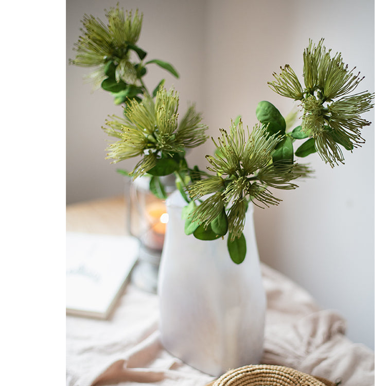 A 25-inch tall Faux Silk Artificial Albizia Flower Stem with three vibrant blooms and a green stem, perfect for home decor.