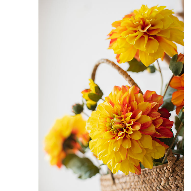 A 29-inch tall faux silk artificial blooming dahlia stem with vibrant petals in black purple, orange, and yellow colors, showcasing realistic details.